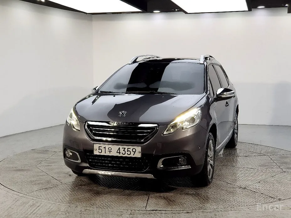 Peugeot 2008 1.6 e-HDi Feline L 2015 года: Французский компактный кроссовер с экономичным дизелем