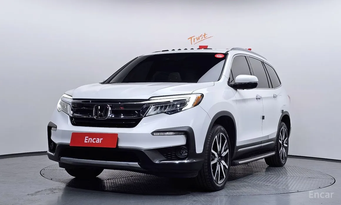 Honda Pilot 3.5 Elite 2022 года: Просторный американский кроссовер с V6 и пробегом 27 767 км